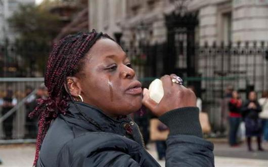Janet Alder protests in tears
